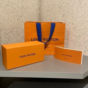 Original Louis vitton shopping bag and a box